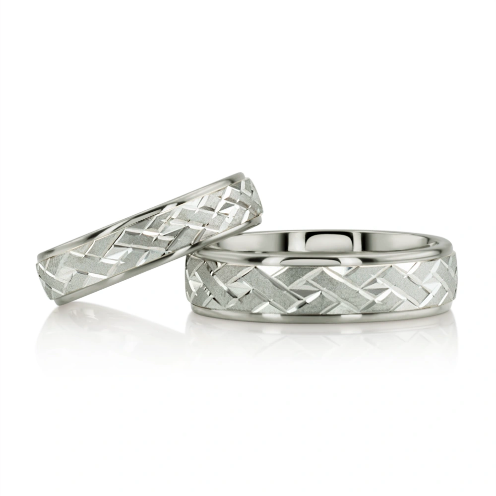 Attractive Angled Cut Diamond Cut Wedding Ring Set - view 1