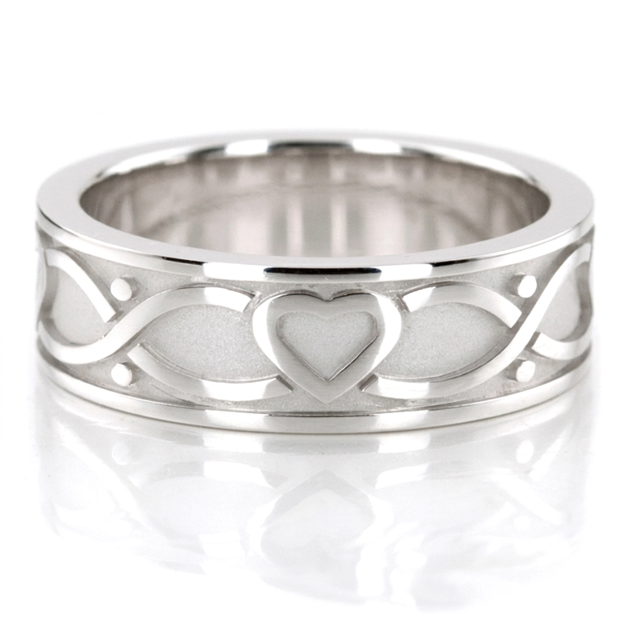 10K white gold 7mm. high polish 7-mm-hearts-design-gold-men's-wedding-band - main view