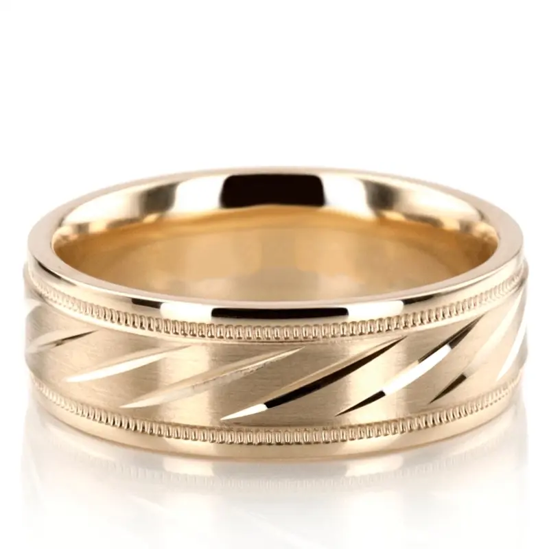 10K yellow gold 7mm. satin basic-carved-diamond-cut-wedding-ring - main view