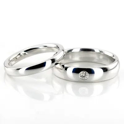 Classic His and Hers Solitaire Dome Wedding Ring Set